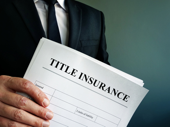 Title insurance for homeowners, providing security against potential title claims.  